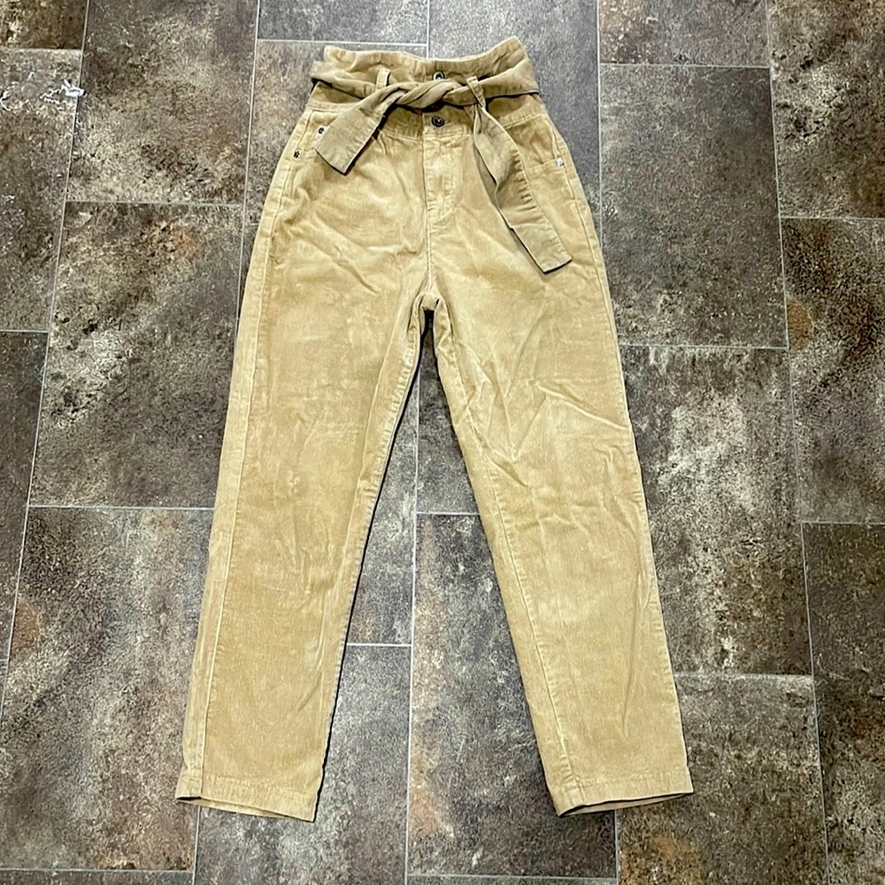 Very stylish brown corduroy pants. Worn twice.